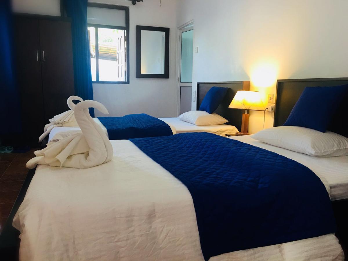 Blue Whale Holiday Hotel Mirissa Chambre photo